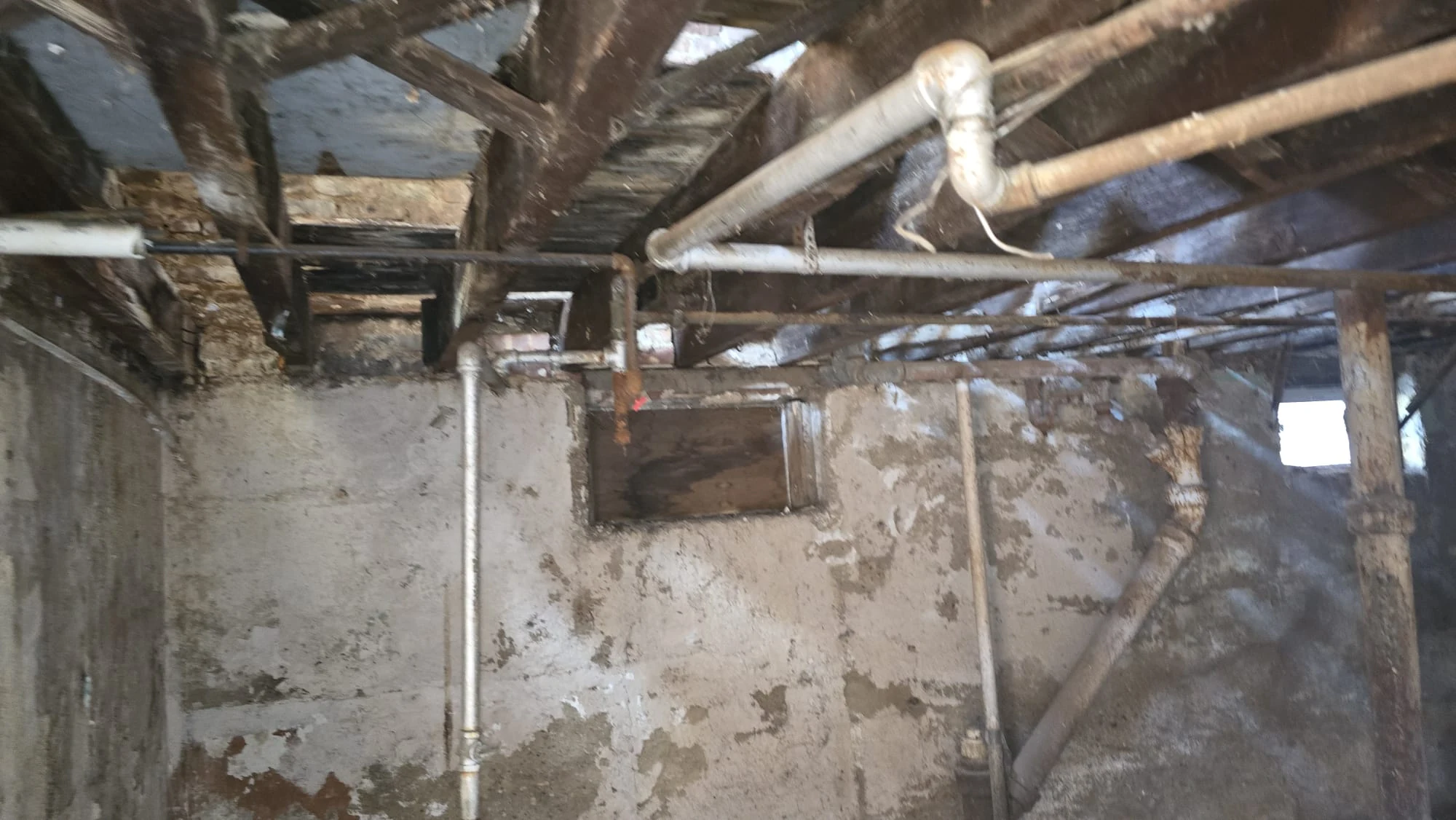 Basement — Deteriorated Joists & Piping