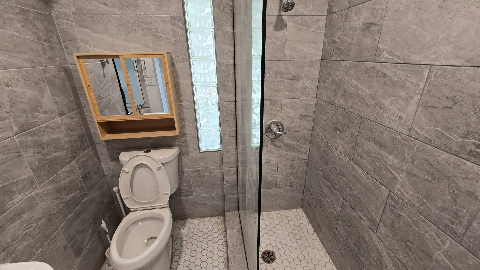 Completed Bathroom — Gray Tile & Walk-In Shower