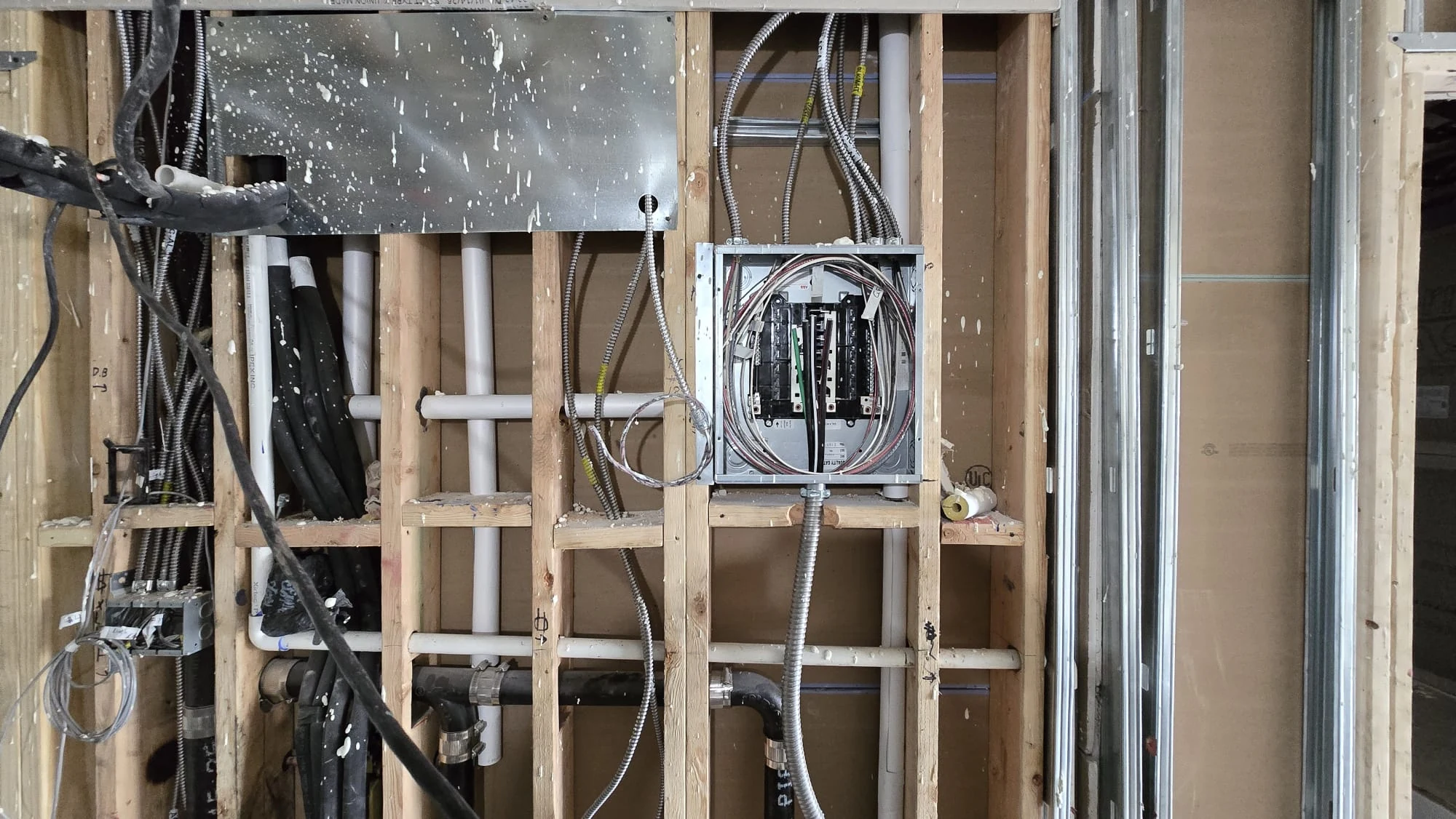 Electrical Panel & Plumbing Rough-In — Wood Framing